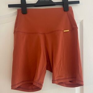 Cleo Harper burnt Orange biker Shorts